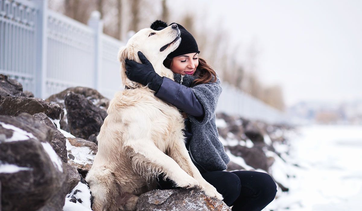 dog-with-woman-in-winter